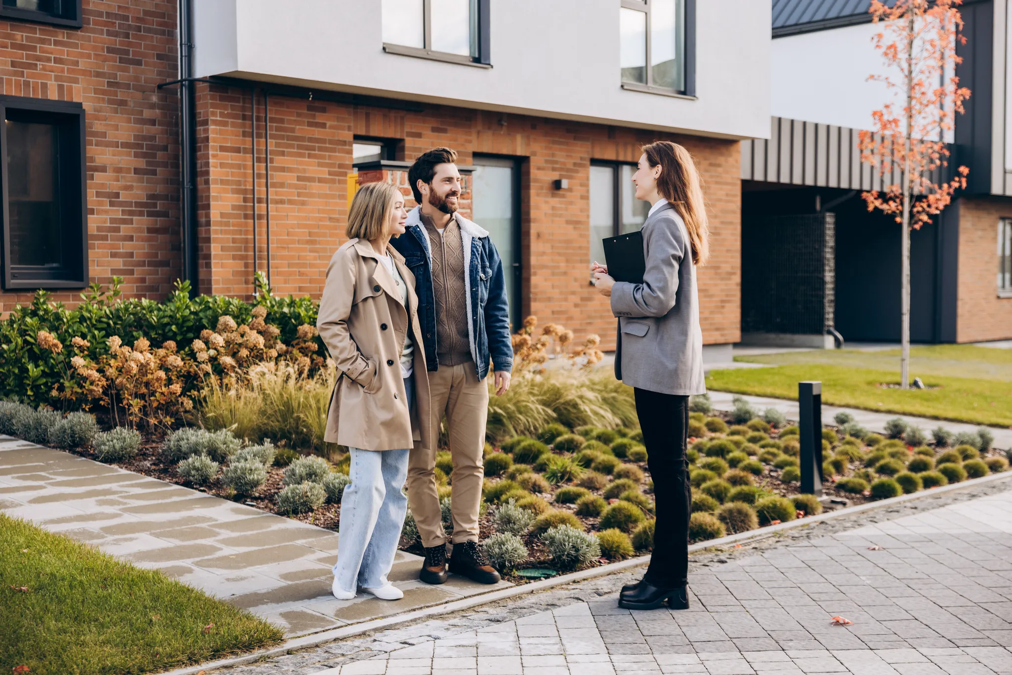 happy-couple-interacting-with-realtor-outside-mode-2026-03-26-23-51-39-utc